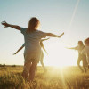 kids-playing-in-field-colin-austin-gbiota