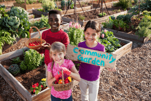 children-smiling-in-garden-colin-austin-gbiota