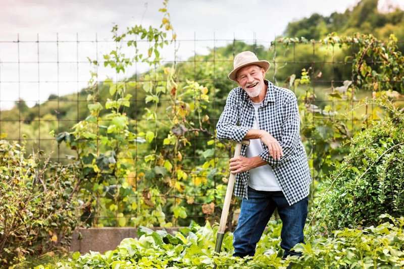 man-smiling-in-garden-colin-austin-gbiota
